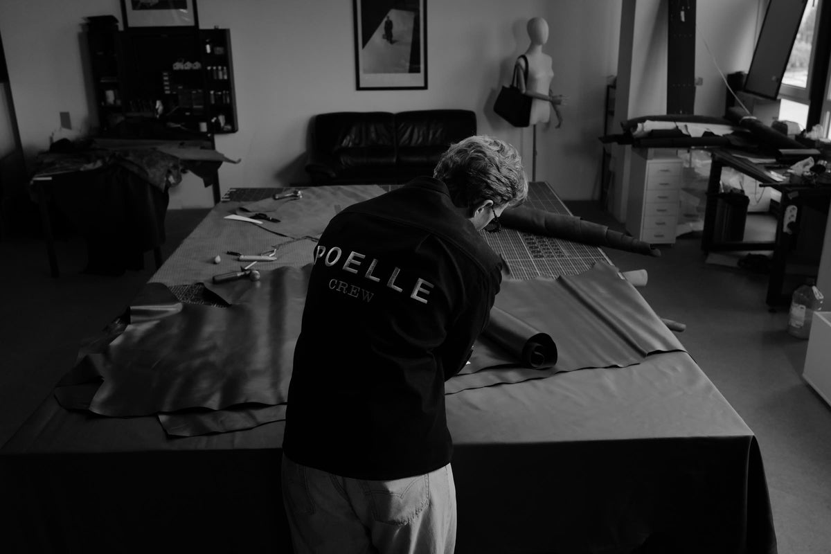 Poelle artisan at the cutting table